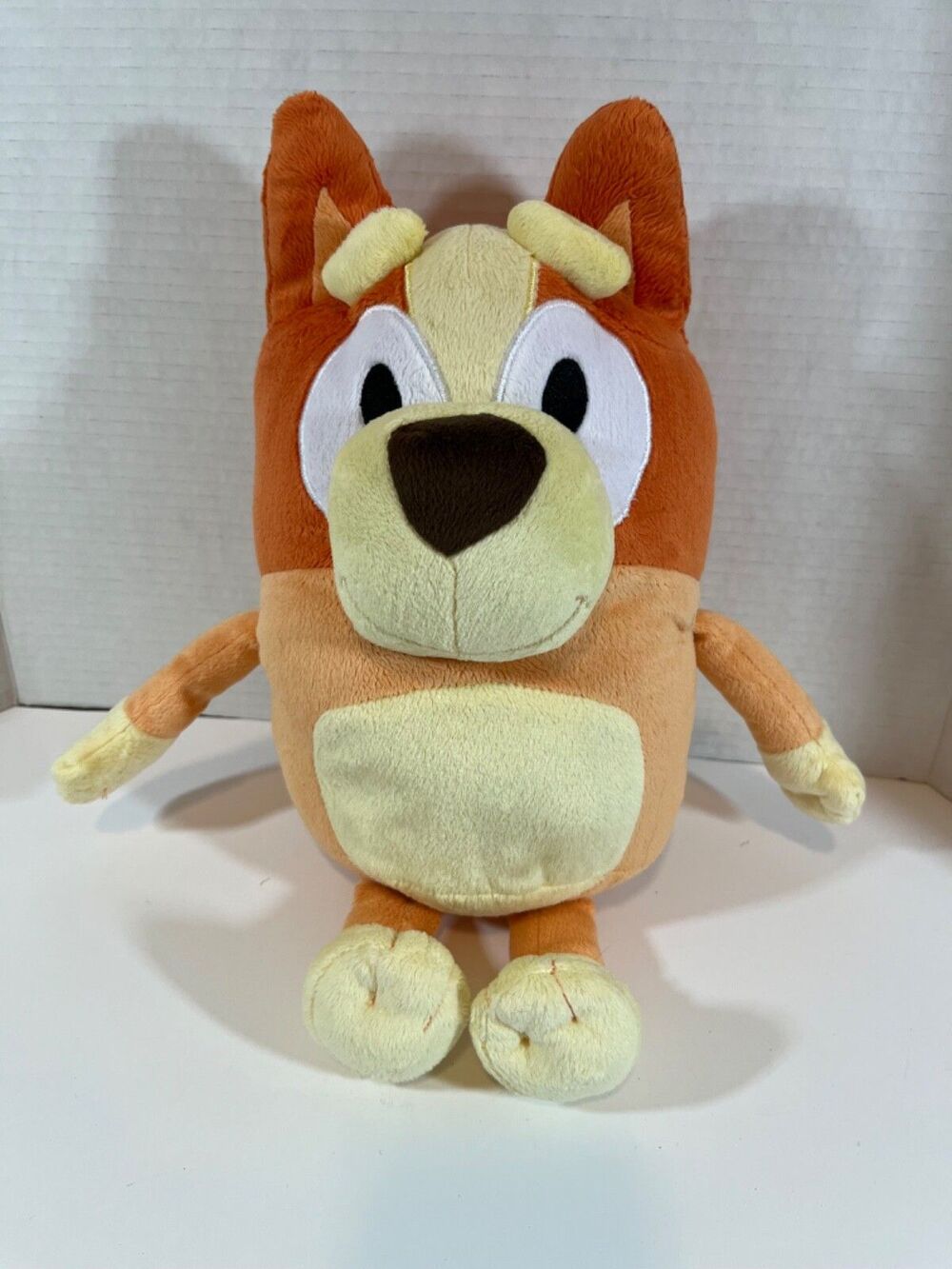 Bluey Sister Bingo sitting at 11" Plush Soft Stuffed Animal Toy